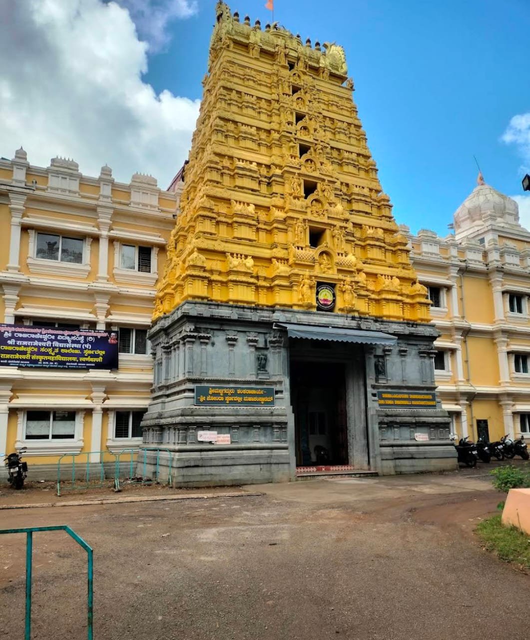 A peaceful monastery complex surrounded by greenery